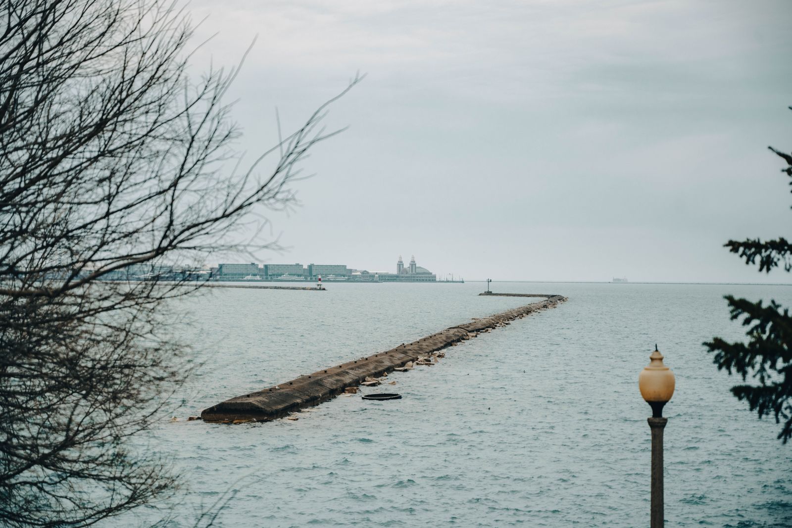 Lake Michigan shoreline and pier representing the North Shore communities served