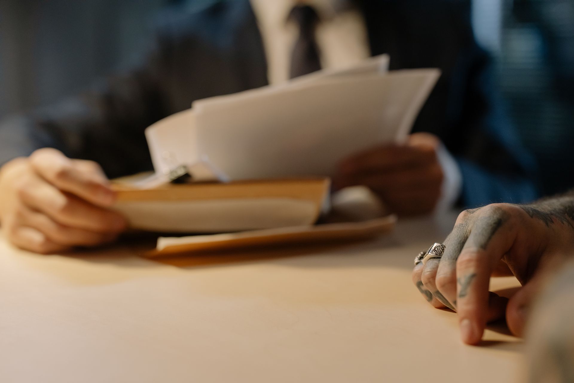 Legal professionals reviewing case records