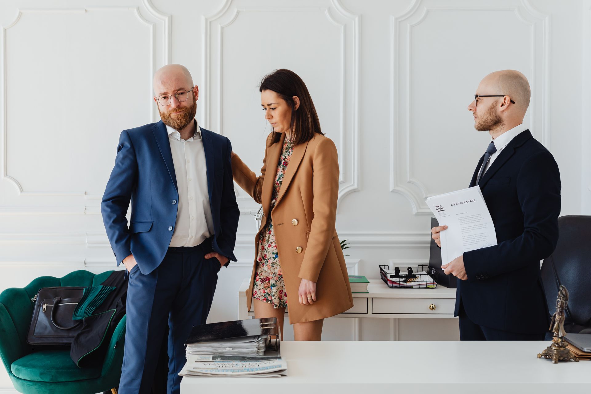 Couple reviewing documents with an attorney