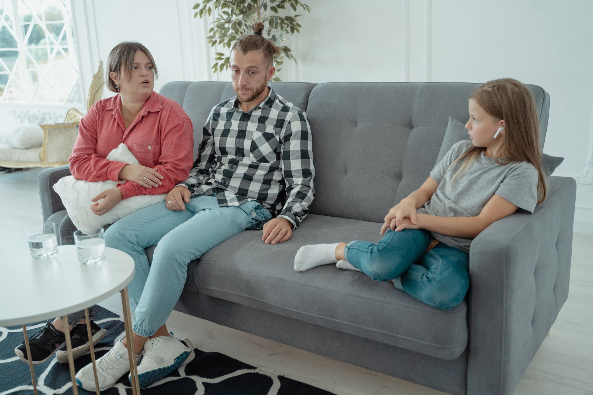 Family discussing an important transition together at home