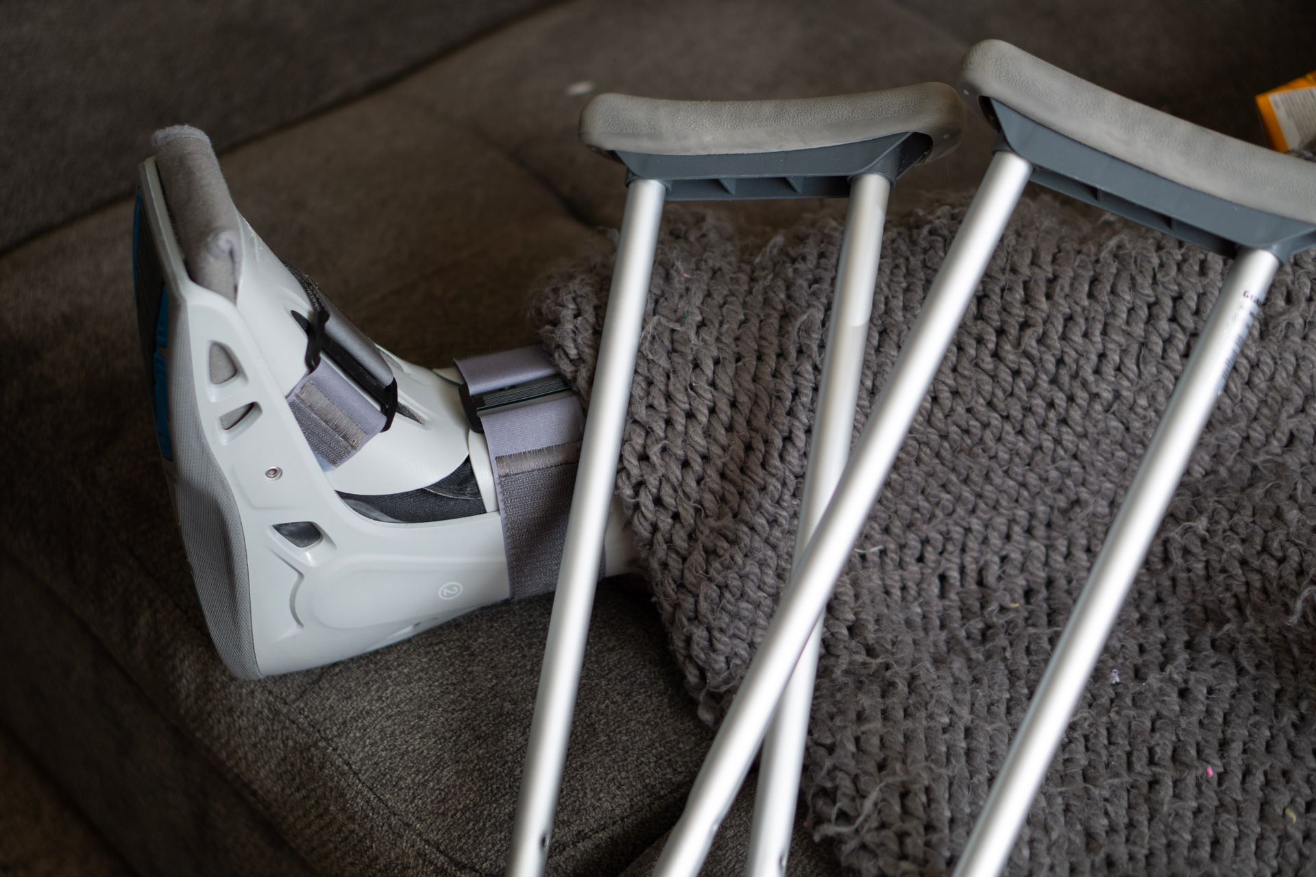 Orthopedic boot and crutches during injury recovery